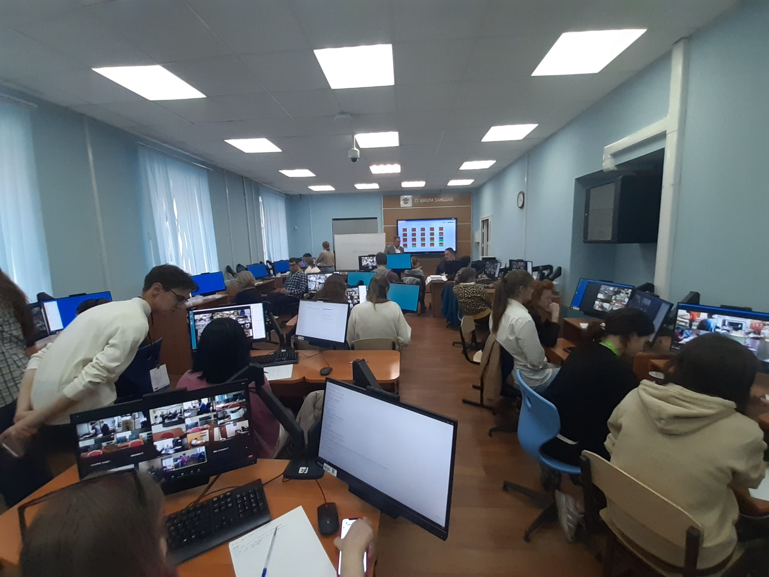 Invigilators monitoring the distributed online format during IMO 2020
